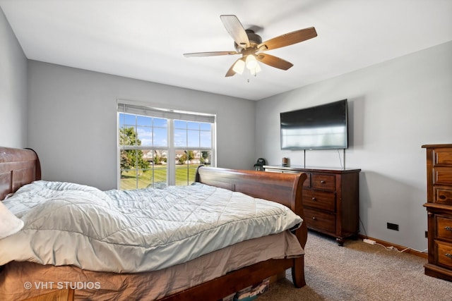 bedroom with light carpet and ceiling fan