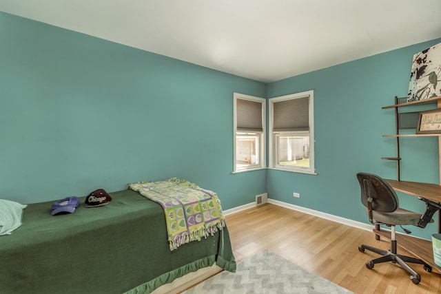 bedroom featuring light wood-type flooring