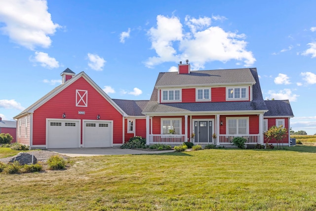 view of front of home with a chimney, covered porch, a front yard, a garage, and driveway