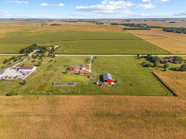 birds eye view of property featuring a rural view