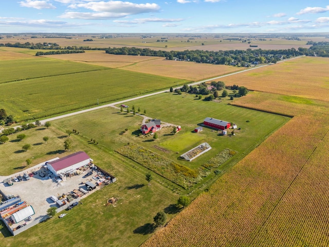 birds eye view of property with a rural view