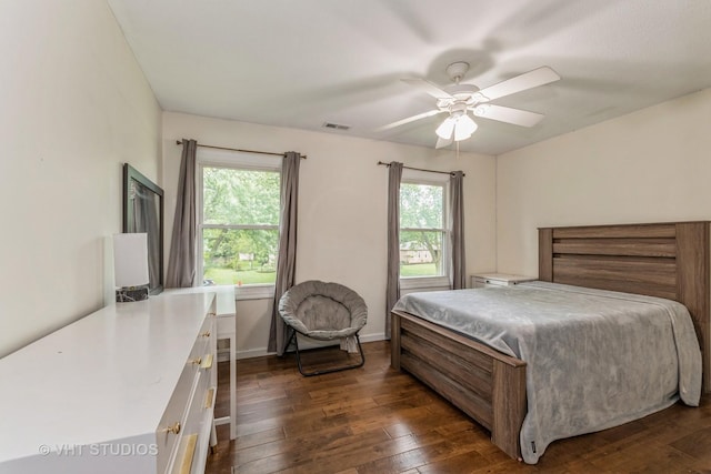 15312 Sunshine Cir, Plainfield, IL 60544 - bedroom featuring dark wood-style floors, a ceiling fan, and baseboards
