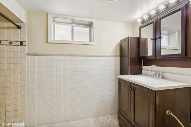 bathroom featuring tile patterned floors and vanity