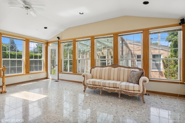 unfurnished sunroom with ceiling fan and vaulted ceiling