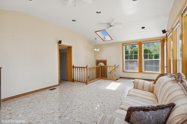 6144 N Keystone Ave, Chicago, IL 60646 - living room with visible vents, lofted ceiling with skylight, baseboards, and ceiling fan with notable chandelier
