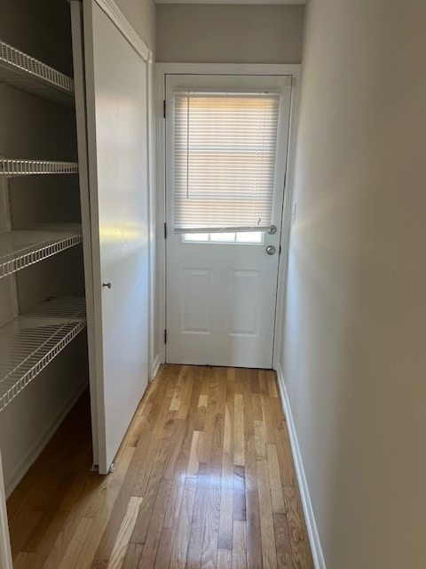 doorway to outside with light hardwood / wood-style floors