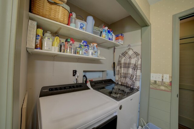 laundry room featuring washing machine and dryer