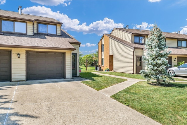 view of property exterior with a lawn and a garage