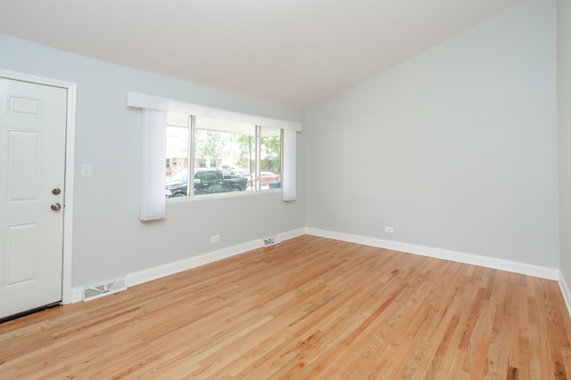 unfurnished room featuring light hardwood / wood-style floors