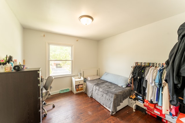 bedroom featuring hardwood / wood-style floors