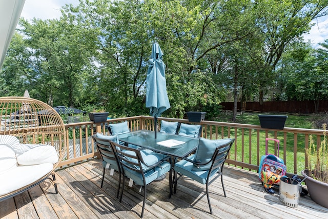 wooden deck with a yard