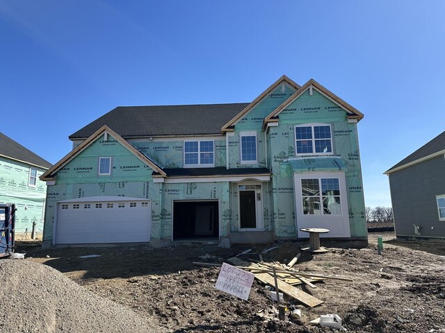 property in mid-construction with a garage