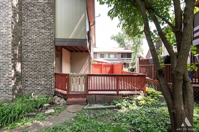 back of house featuring a deck