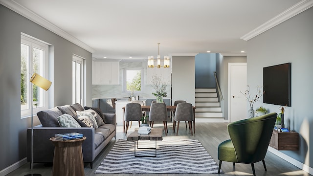 living room featuring hardwood / wood-style flooring, crown molding, and a healthy amount of sunlight