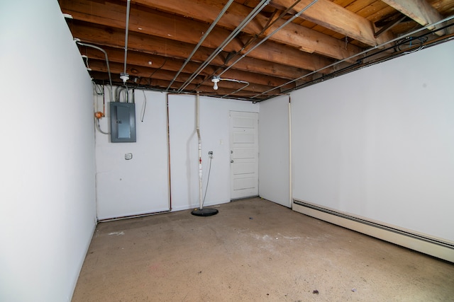 basement with electric panel and a baseboard radiator