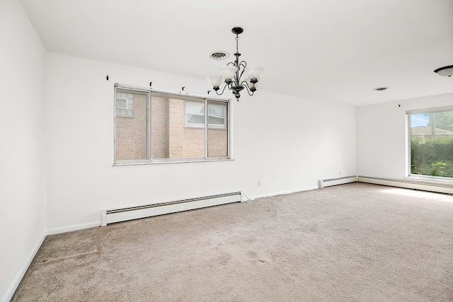 unfurnished room featuring a baseboard radiator, an inviting chandelier, and light carpet