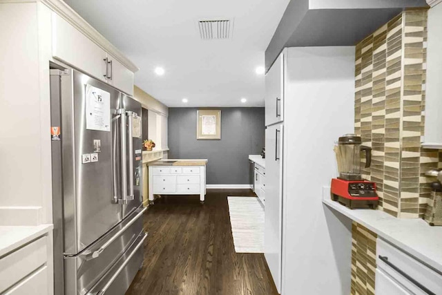 680 N Lake Shore Dr Unit 519, Chicago, IL 60611 - kitchen featuring recessed lighting, high end fridge, light countertops, dark wood-style flooring, and visible vents