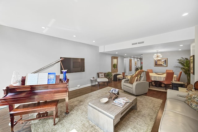 680 N Lake Shore Dr Unit 519, Chicago, IL 60611 - living room with visible vents, baseboards, recessed lighting, wood finished floors, and a notable chandelier