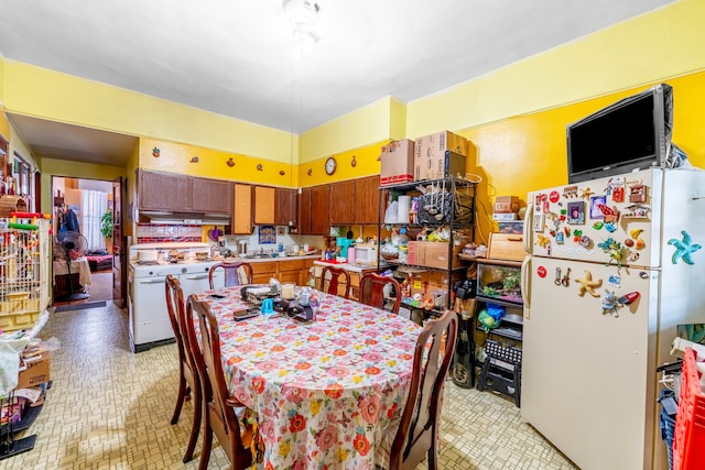 dining area with light tile patterned flooring