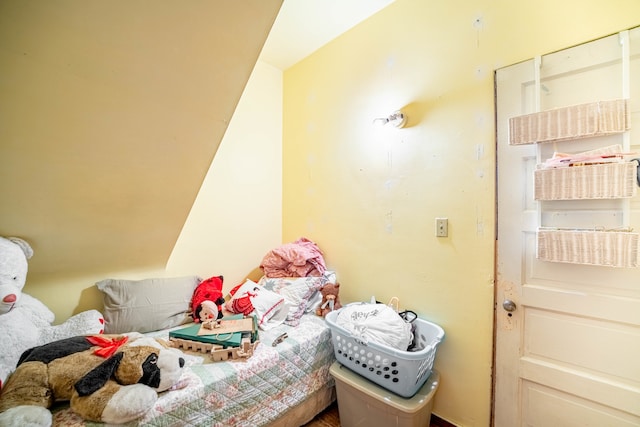 playroom featuring vaulted ceiling