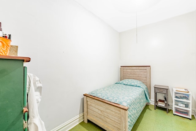 bedroom with tile patterned floors