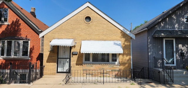 view of front of property with brick siding