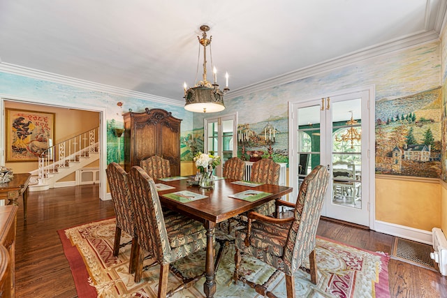 dining space with ornamental molding, french doors, and dark hardwood / wood-style floors