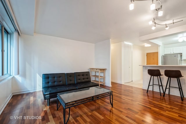 living area with light hardwood / wood-style floors