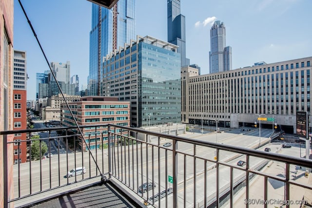 balcony featuring a city view