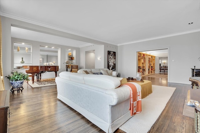 living room featuring ornamental molding and dark hardwood / wood-style flooring