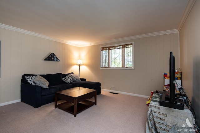 living room with crown molding and carpet