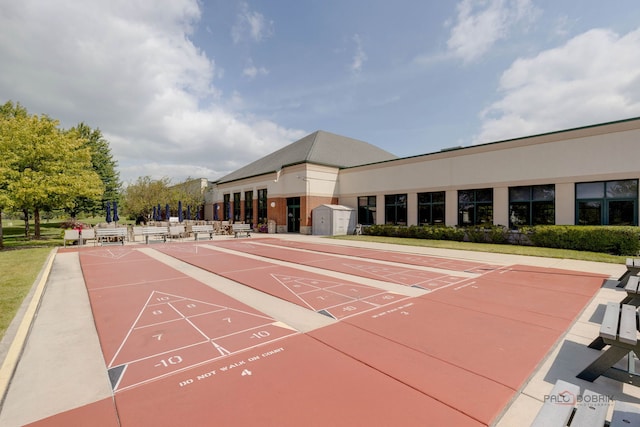 view of community featuring shuffleboard