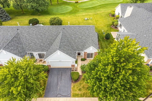 drone / aerial view with view of golf course