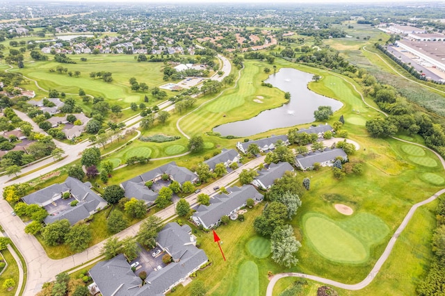 bird's eye view featuring a residential view, view of golf course, and a water view