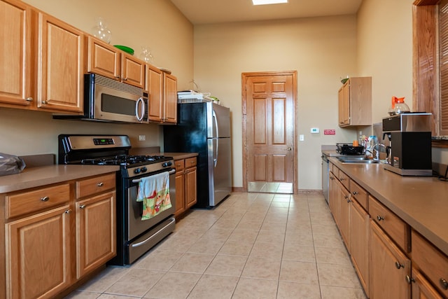 LOT8 W Windemere Cir, Lockport, IL 60441 - kitchen featuring stainless steel appliances, light tile patterned floors, a sink, and baseboards