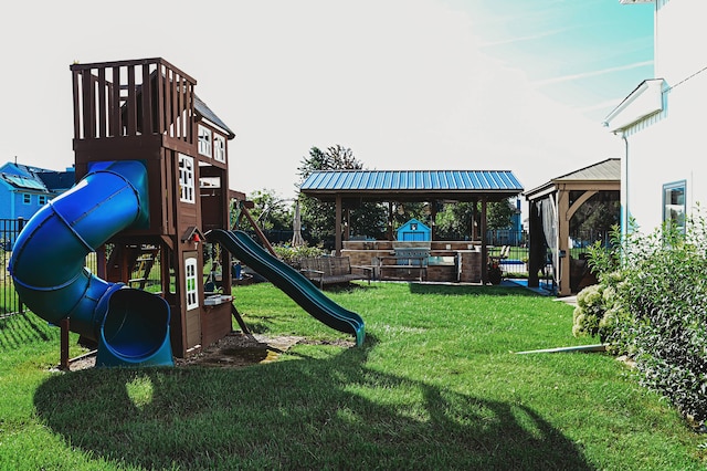 view of playground featuring a gazebo and a yard