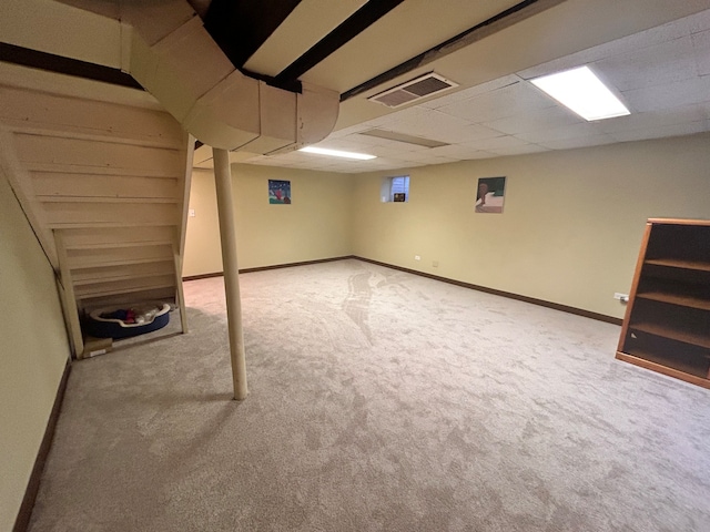 basement with carpet flooring