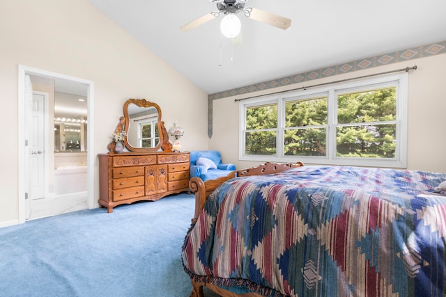 bedroom featuring ceiling fan, connected bathroom, carpet floors, and lofted ceiling