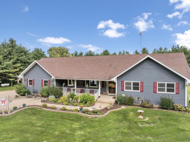 ranch-style house with a porch and a front lawn