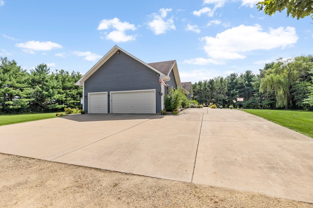 view of side of home with a garage