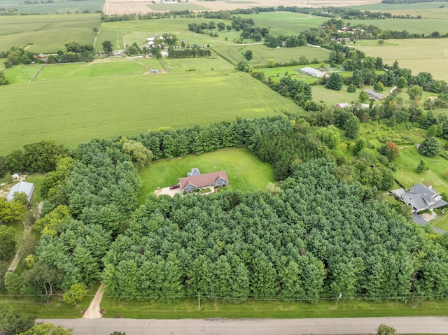 birds eye view of property featuring a rural view