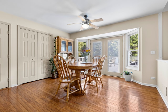 dining space featuring ceiling fan and light hardwood / wood-style floors