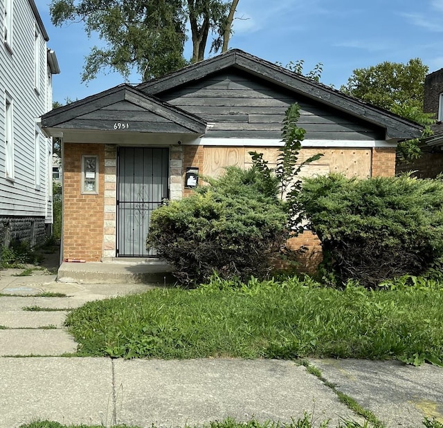 6951 S Hermitage Ave, Chicago, IL 60636 - view of front of house featuring brick siding