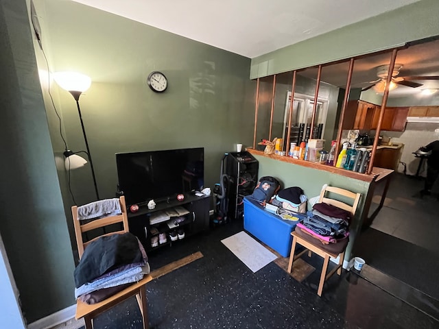 living room featuring ceiling fan