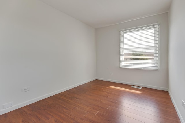 1781 Queensbury Cir, Hoffman Estates, IL 60169 - empty room featuring baseboards and wood finished floors