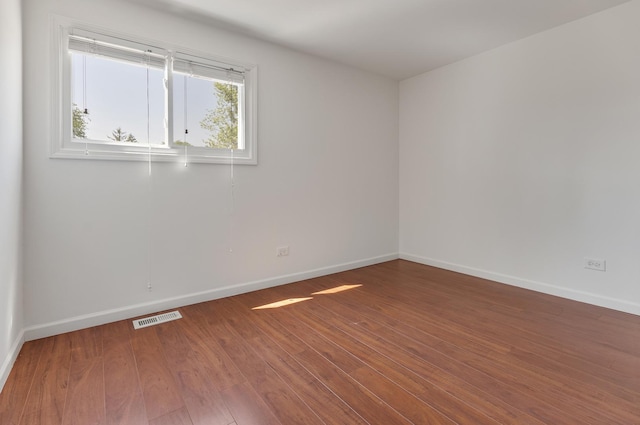 1781 Queensbury Cir, Hoffman Estates, IL 60169 - spare room featuring baseboards and wood finished floors