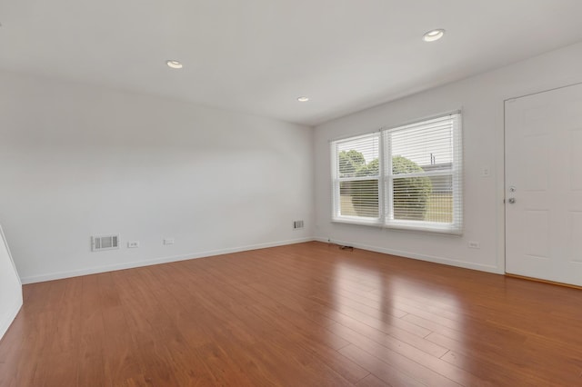 1781 Queensbury Cir, Hoffman Estates, IL 60169 - unfurnished room with wood finished floors and recessed lighting