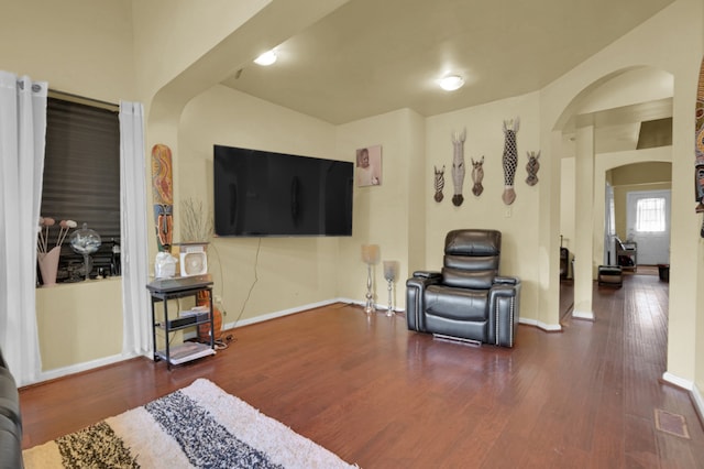 living room with dark wood-type flooring