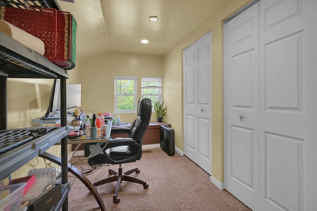 office space featuring lofted ceiling and carpet