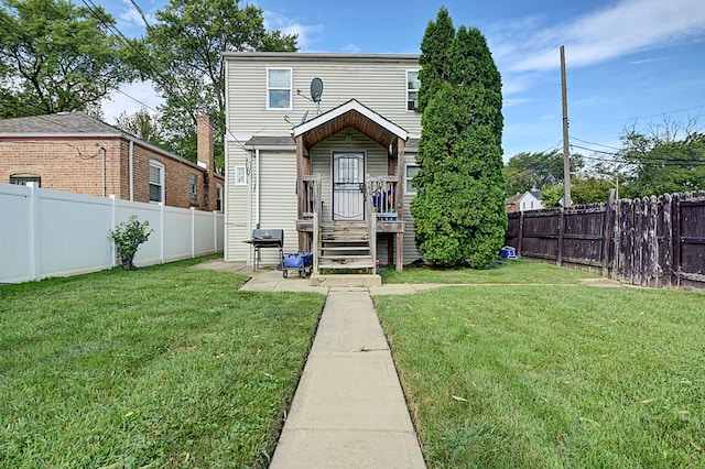 view of front of house with a front lawn